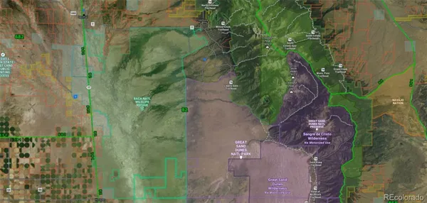 a aerial view of a residential houses with outdoor space