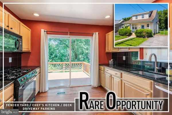 a view of kitchen with stainless steel appliances granite countertop a stove a sink and a microwave