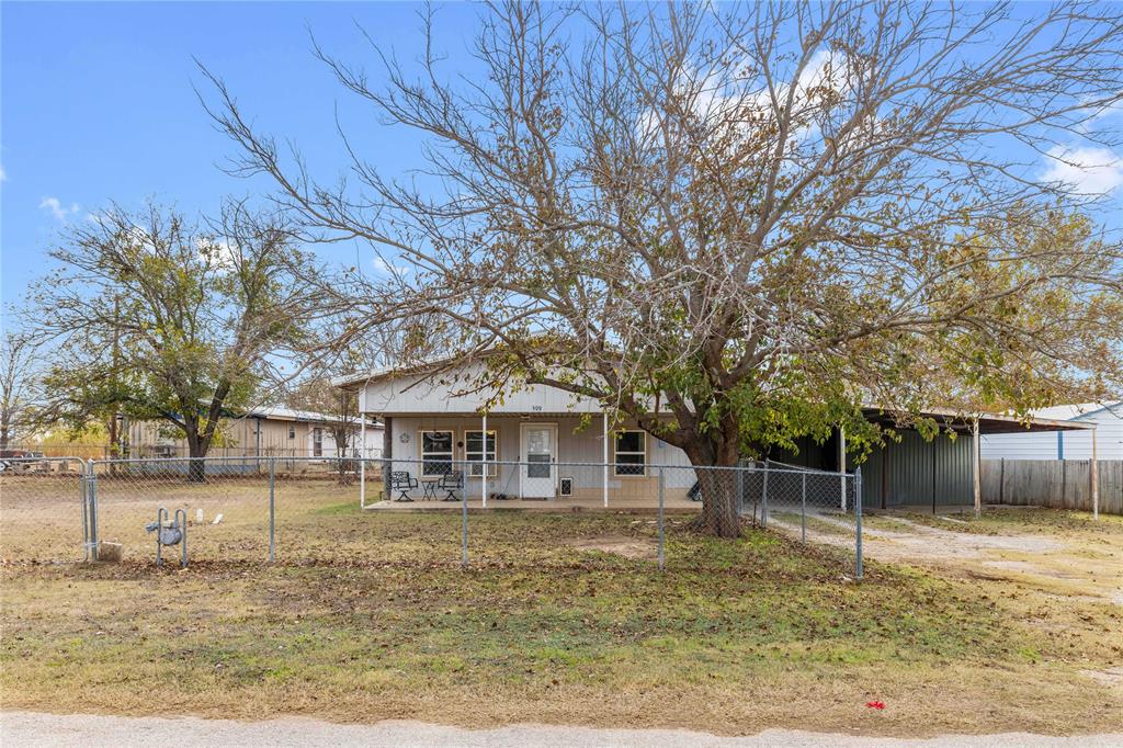 309 Goodwin Street Bangs, TX 76823 - Photo 1 of 20 View of front of home featuring a patio area