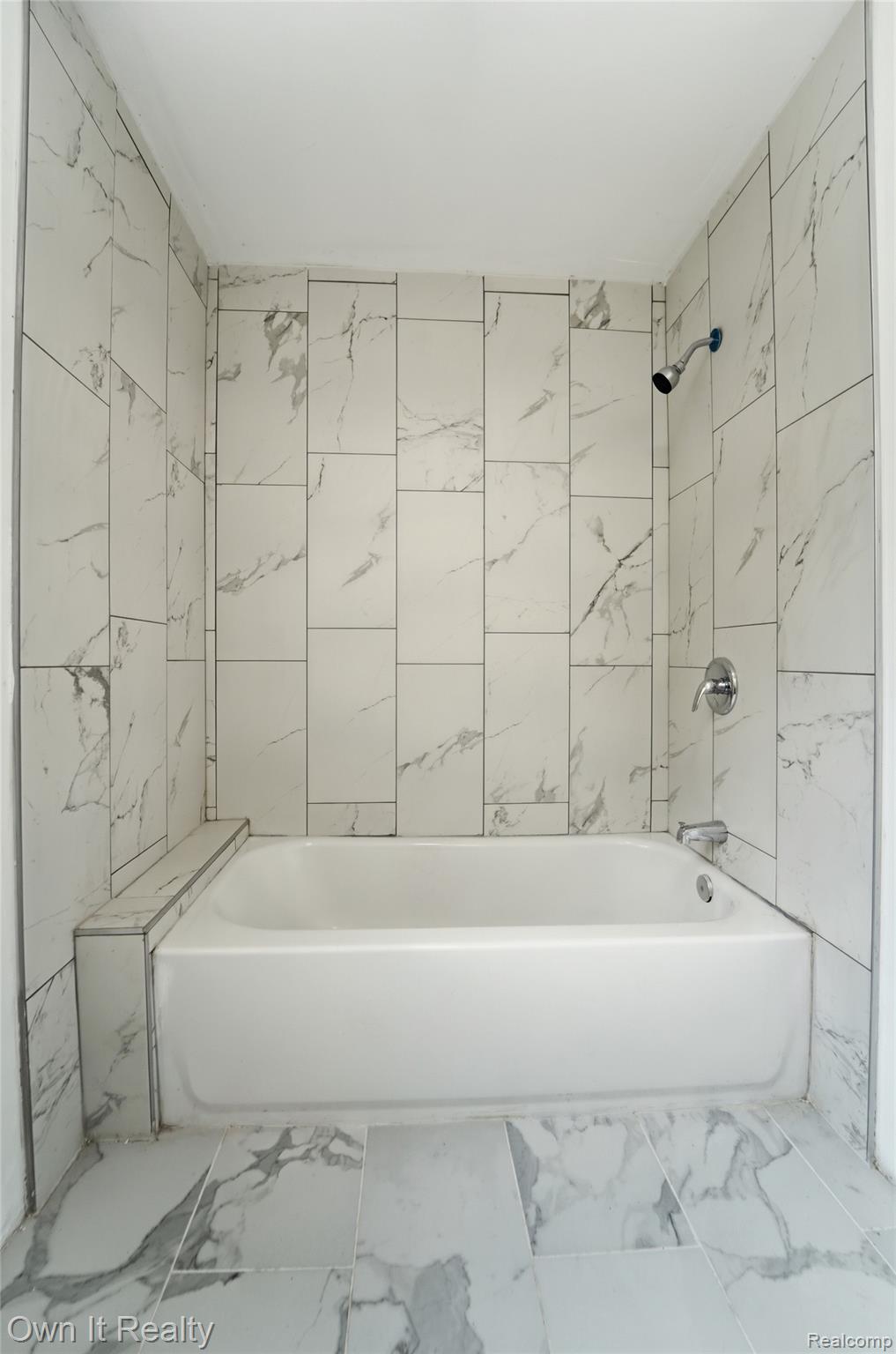 17351 Appoline Street Detroit, MI 48235 - Photo 13 of 34 Bathtub with surrounding wall and floor tile