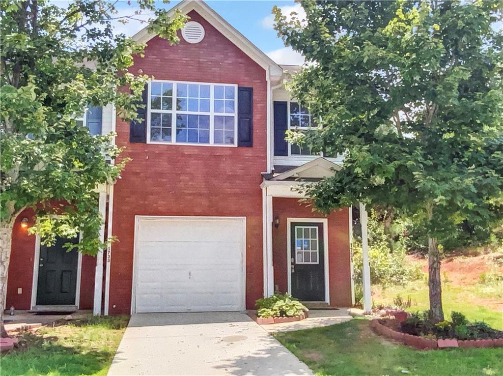 1731 Fielding Way Hampton, GA 30228 - Photo 1 of 1 front view of a house with a yard