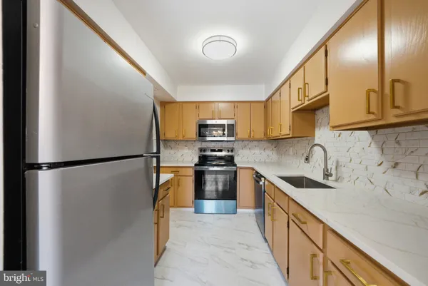 a utility room with cabinets