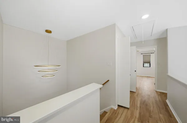 a view of hallway with stairs