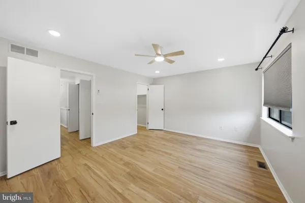 a view of a room with racks on the wall