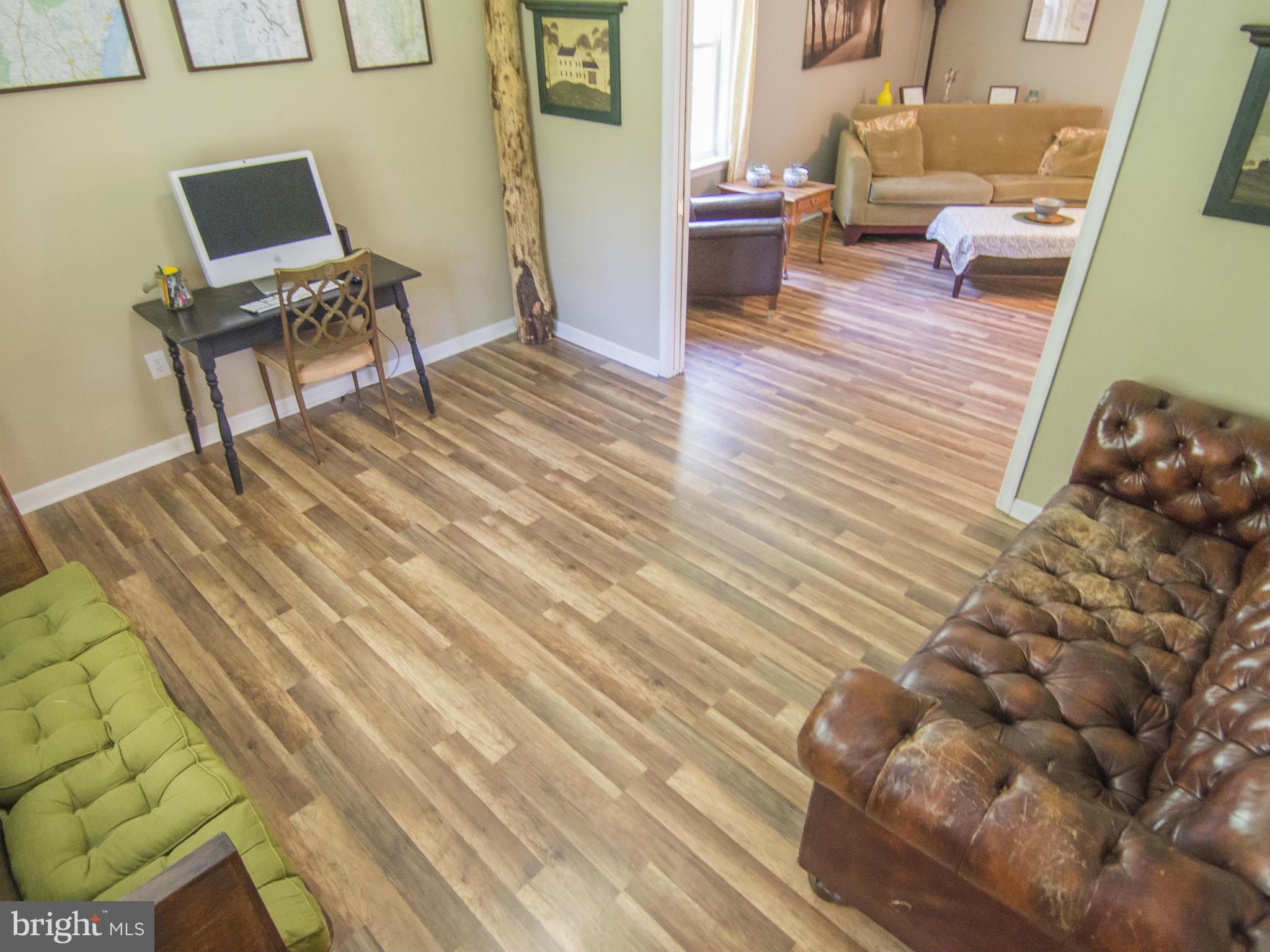 4330 Harvey Road Huntingtown, MD 20639 - Photo 5 of 30 a workspace with wooden floor