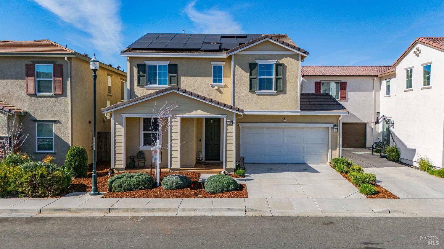 2382 Sheldon Drive Fairfield, CA 94533 - Photo 2 of 63 a front view of a house with a yard and potted plants