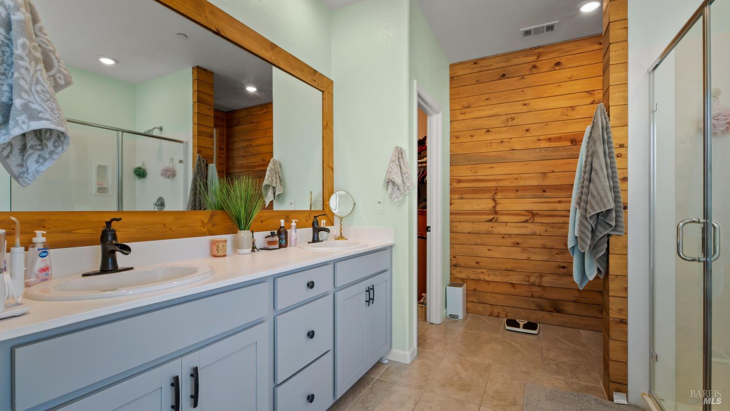 2382 Sheldon Drive Fairfield, CA 94533 - Photo 34 of 63 a bathroom with a double vanity sink mirror and shower