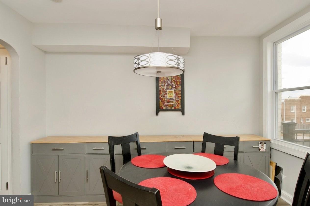 1702 Lang Place Northeast Washington, DC 20002 - Photo 8 of 29 Modern dining space with natural light.