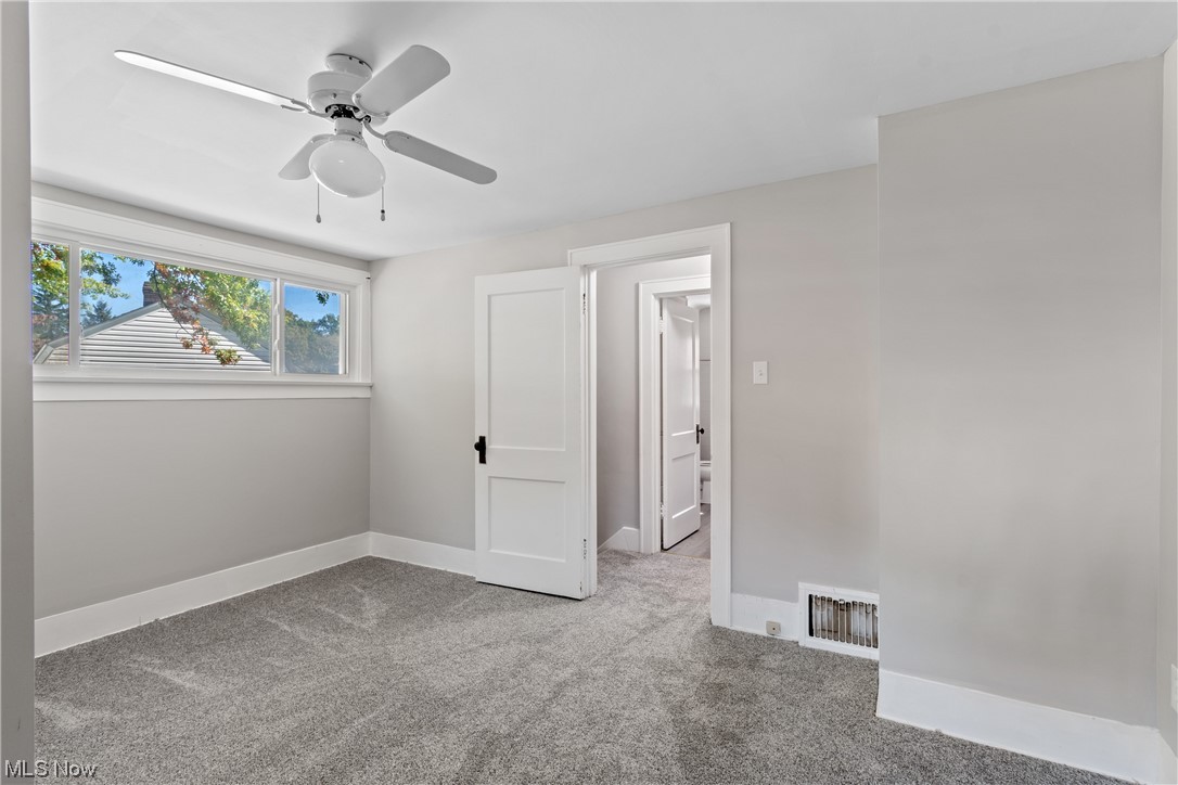 1111 Riverside Drive Akron, OH 44310 - Photo 21 of 31 Carpeted spare room featuring ceiling fan