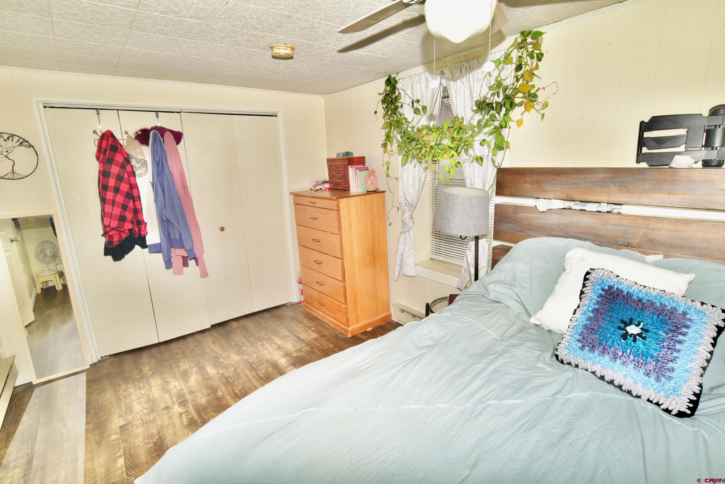 839 B Street Delta, CO 81416 - Photo 15 of 27 a bedroom with a bed and a window