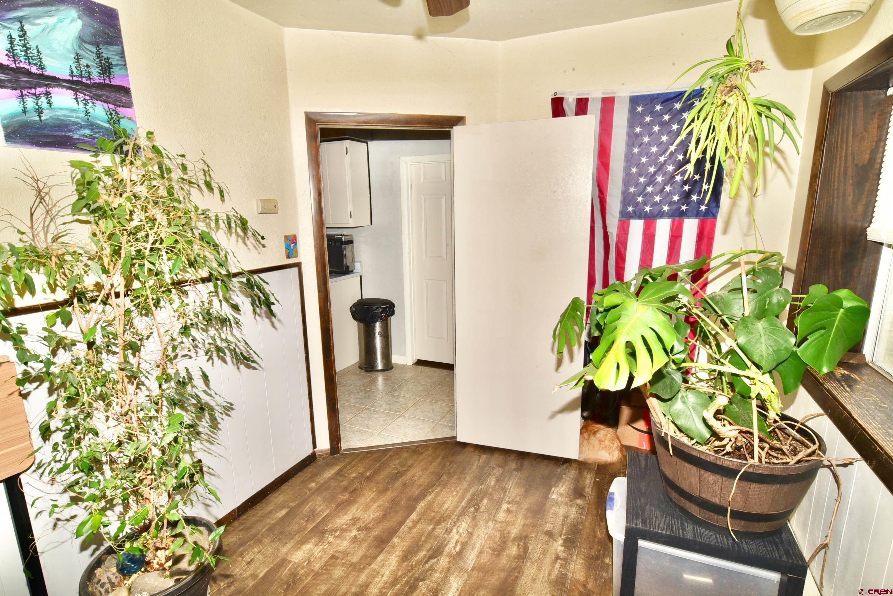 839 B Street Delta, CO 81416 - Photo 17 of 27 a view of entryway with flower plant