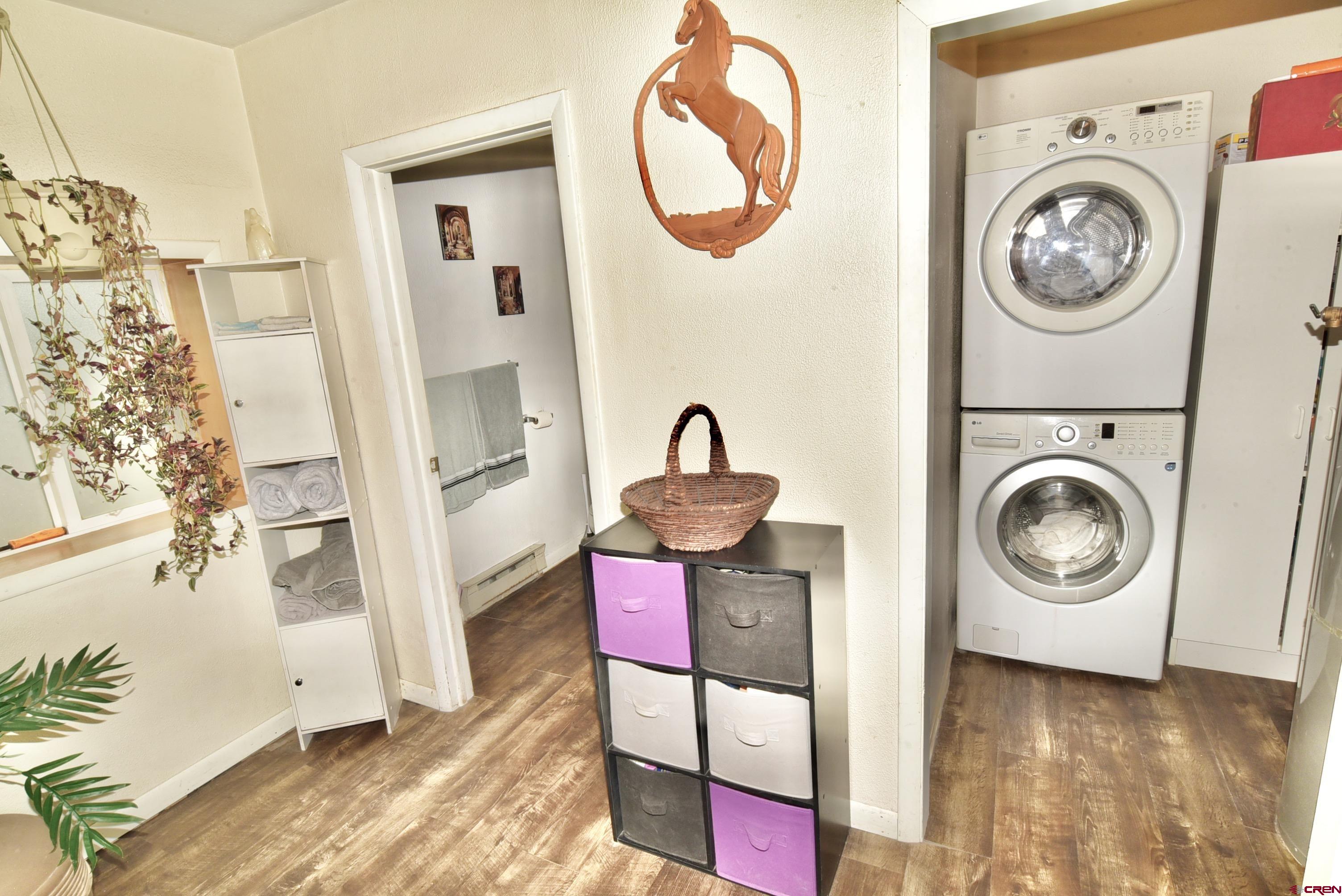 839 B Street Delta, CO 81416 - Photo 10 of 27 a view of a storage and utility room with washer and dryer