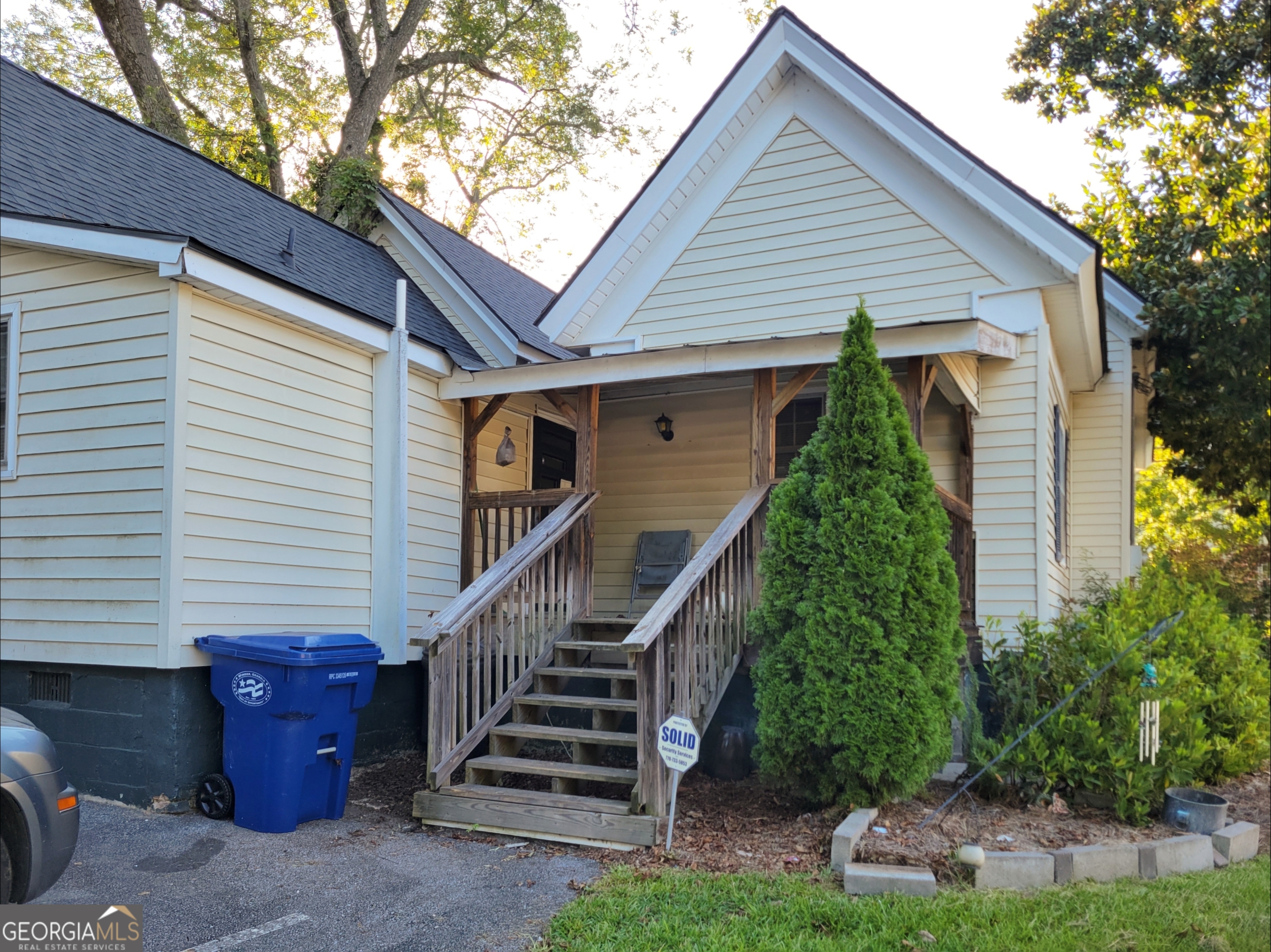 160 North Broad Street, Unit B Winder, GA 30680 - Photo 6 of 7 a front view of a house with a yard