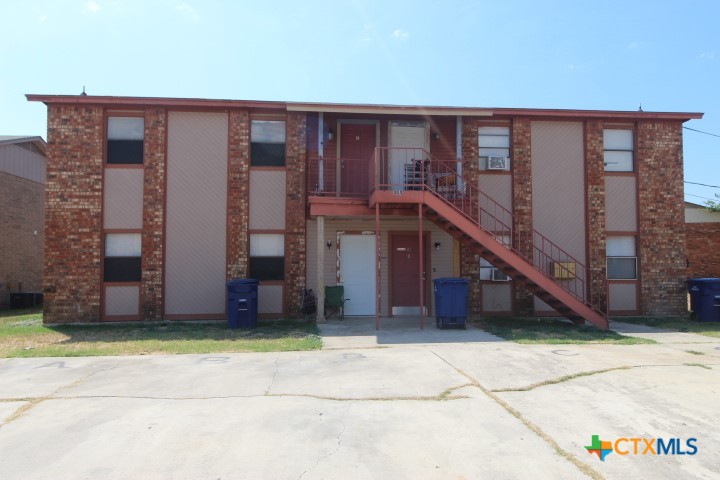 304 Erby Avenue, Unit C Copperas Cove, TX 76522 - Photo 1 of 9 a view of a house with wooden fence