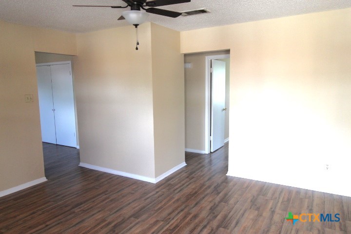 304 Erby Avenue, Unit C Copperas Cove, TX 76522 - Photo 3 of 9 a view of a hallway with wooden floor