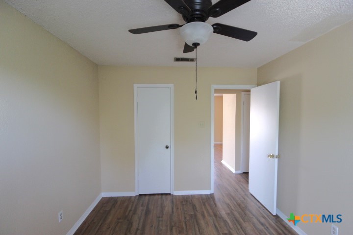 304 Erby Avenue, Unit C Copperas Cove, TX 76522 - Photo 7 of 9 a view of hallway with wooden floor