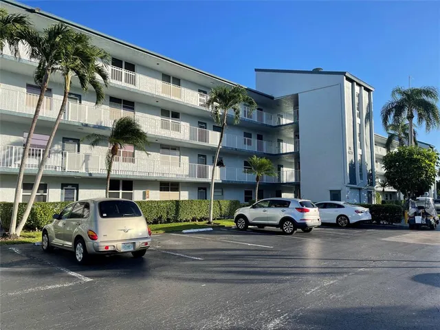 a car parked in front of a building