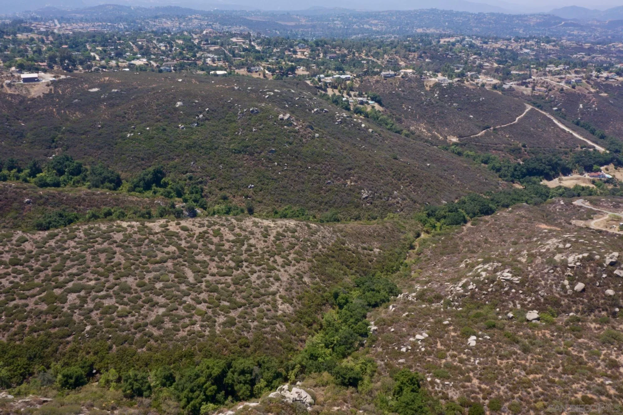 Victoria Drive, Unit 18 Alpine, CA 91901 - Photo 24 of 58 an aerial view of residential house and green space