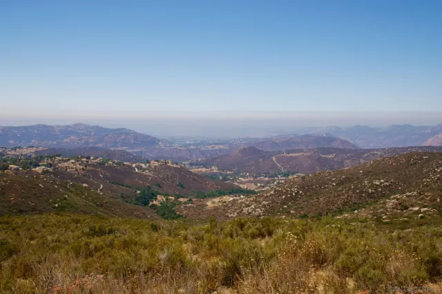 a view of a houses with a yard