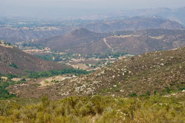 an aerial view of residential house and green space