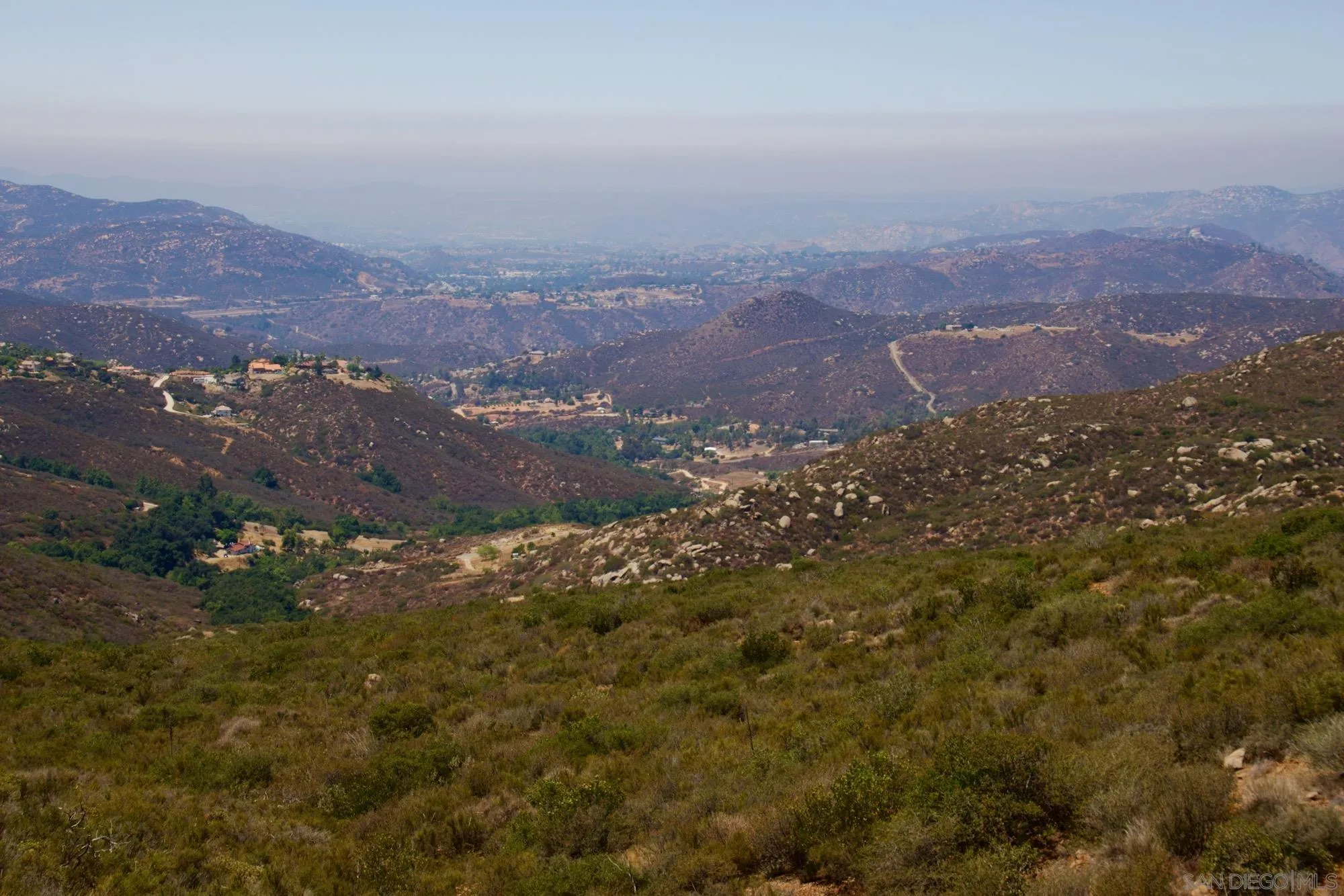 Victoria Drive, Unit 18 Alpine, CA 91901 - Photo 53 of 58 an aerial view of house with yard and mountain view in back