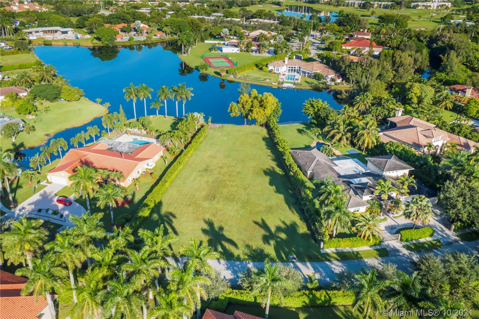 0 Ranch Road Weston, FL 33326 - Photo 2 of 16 a view of a multi story building with a yard