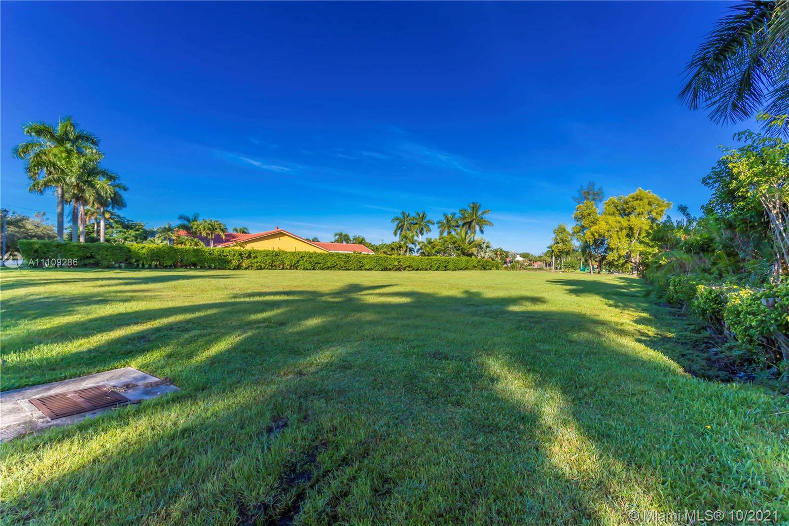 0 Ranch Road Weston, FL 33326 - Photo 14 of 16 a view of a golf course with a big yard