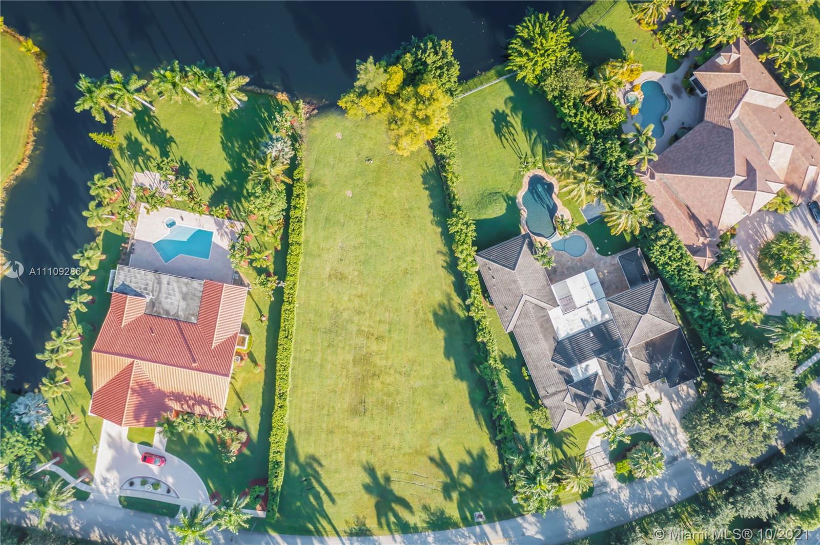 0 Ranch Road Weston, FL 33326 - Photo 4 of 16 an aerial view of residential house with swimming pool and lawn chairs