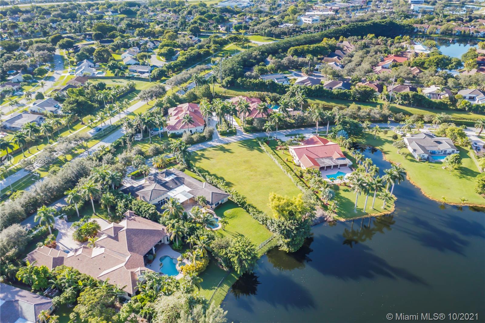 0 Ranch Road Weston, FL 33326 - Photo 7 of 16 an aerial view of a houses with swimming pool