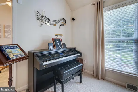a view of hallway with washer and dryer