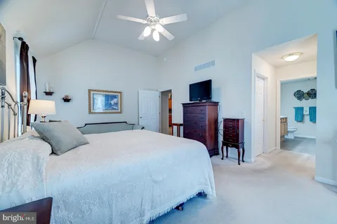 a room with furniture and a large window
