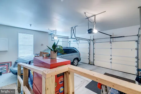 a view of a lounge chairs in back of the house