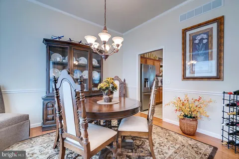 a kitchen with granite countertop a sink and a stove top oven