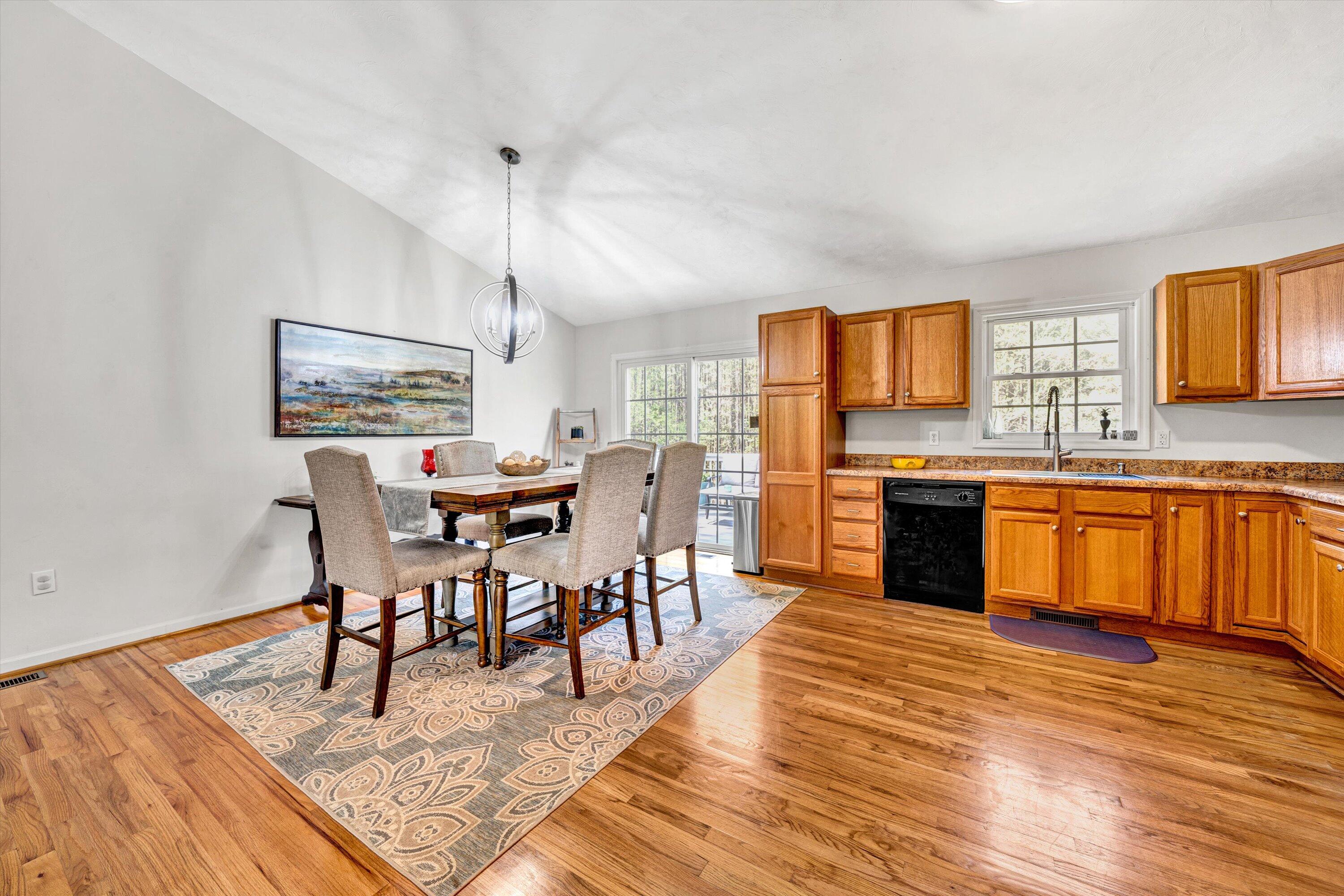 781 Holland Road Callaway, VA 24067 - Photo 12 of 42 a view of a dining room with furniture window and wooden floor