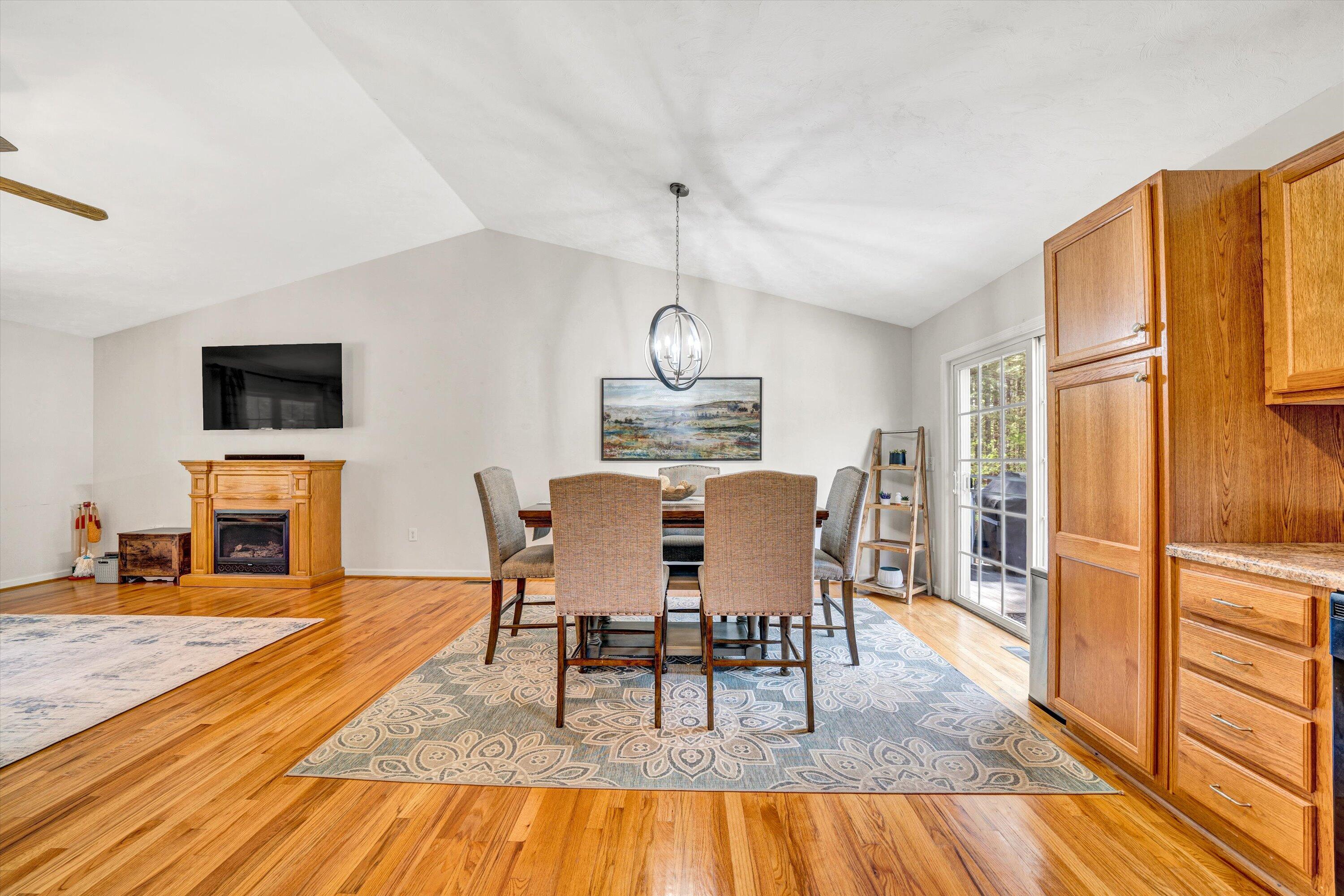 781 Holland Road Callaway, VA 24067 - Photo 14 of 42 a view of a dining room with furniture a rug and wooden floor