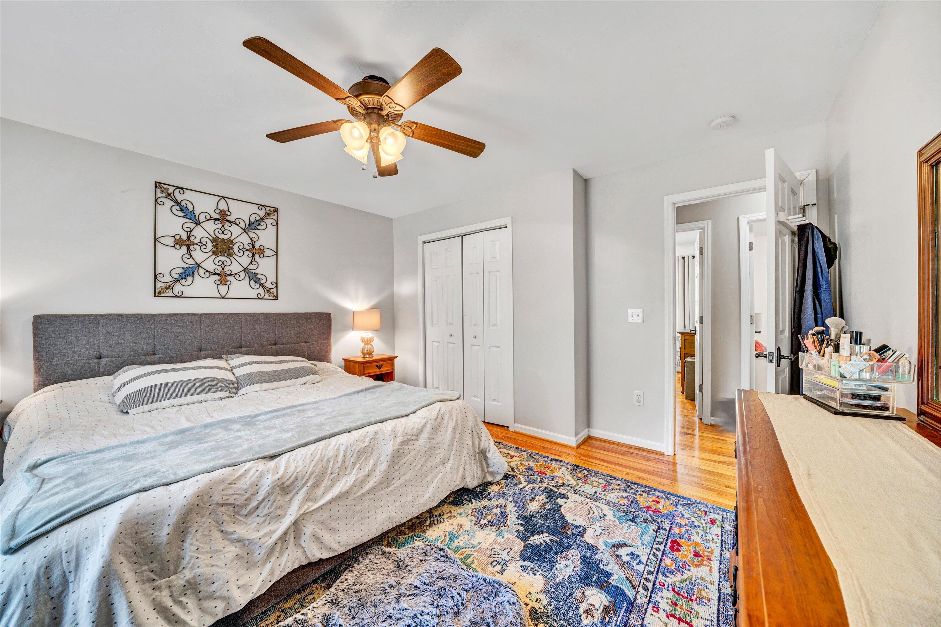 781 Holland Road Callaway, VA 24067 - Photo 20 of 42 a bedroom with bed and a chandelier