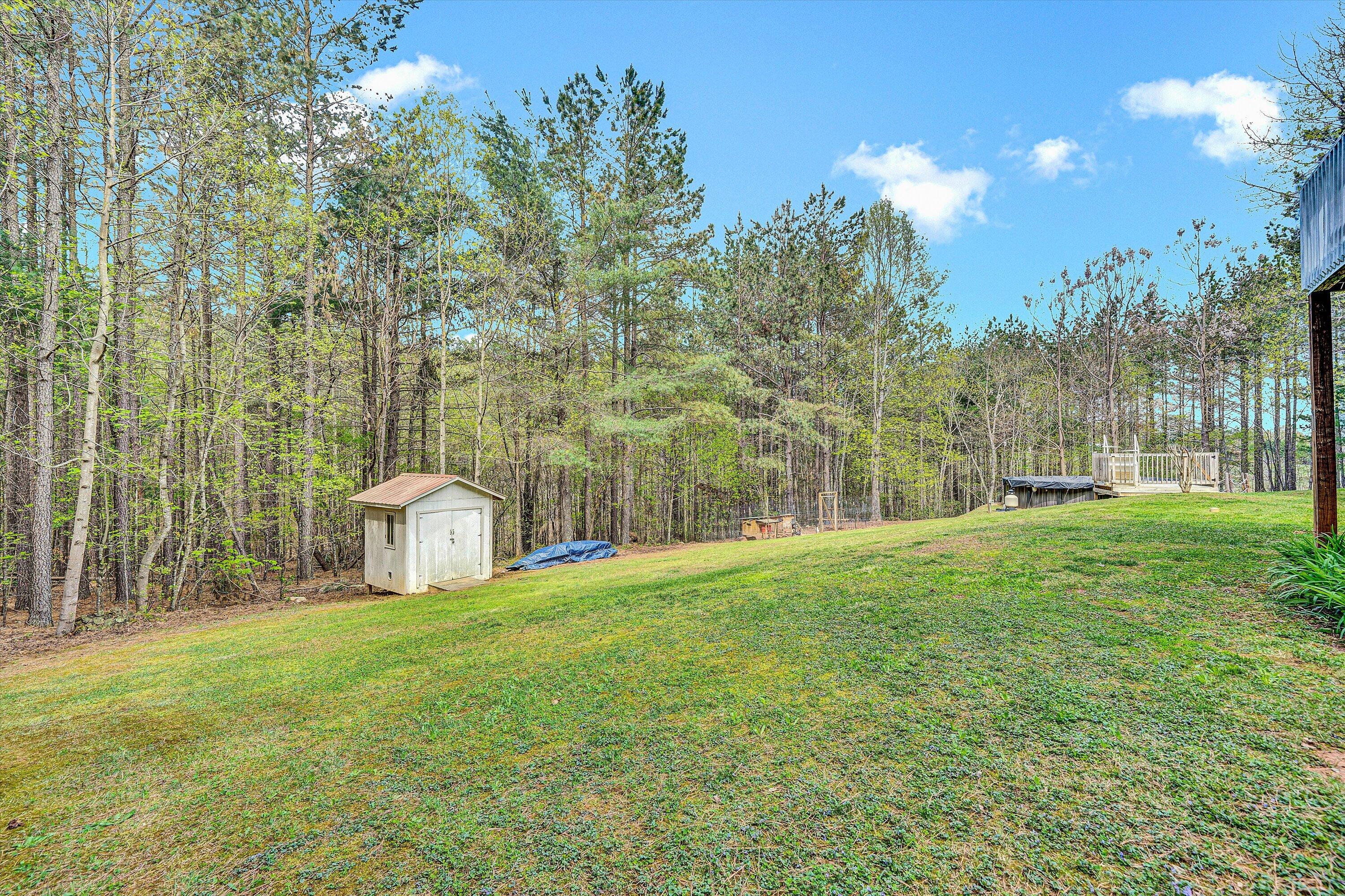 781 Holland Road Callaway, VA 24067 - Photo 36 of 42 a view of house with backyard and tree