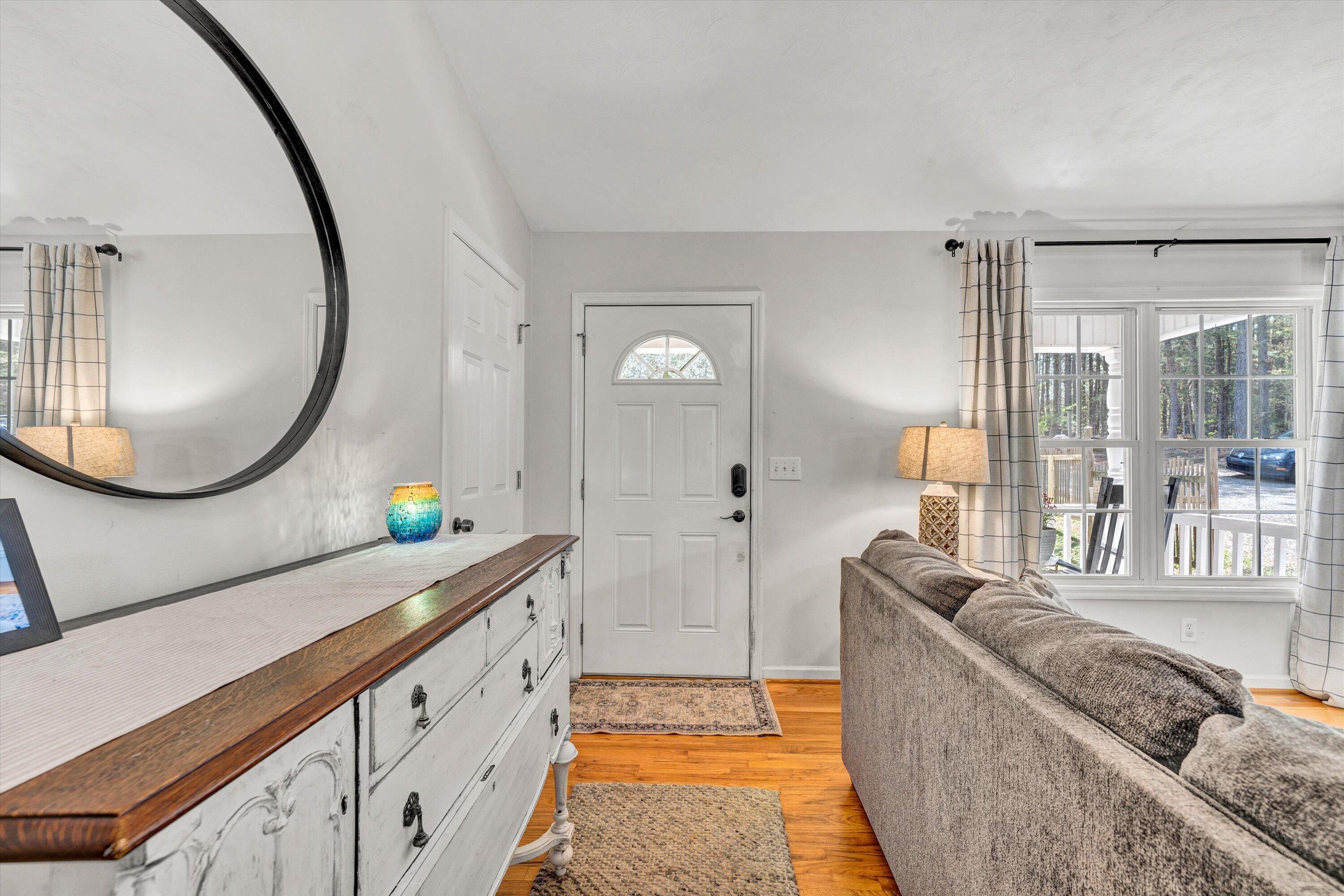 781 Holland Road Callaway, VA 24067 - Photo 5 of 42 a spacious bathroom with a granite countertop tub sink and mirror