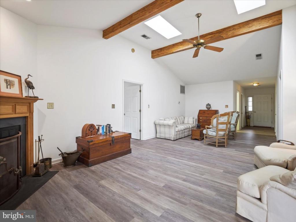 169 Arrowhead Loop Hedgesville, WV 25427 - Photo 3 of 24 a living room with furniture and a fireplace