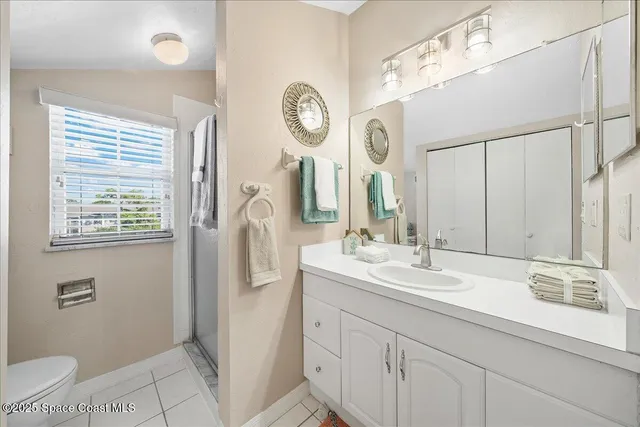 a vase of flowers sitting on a table