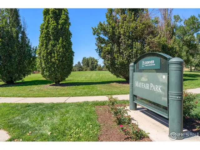 a view of a sign board with a big yard