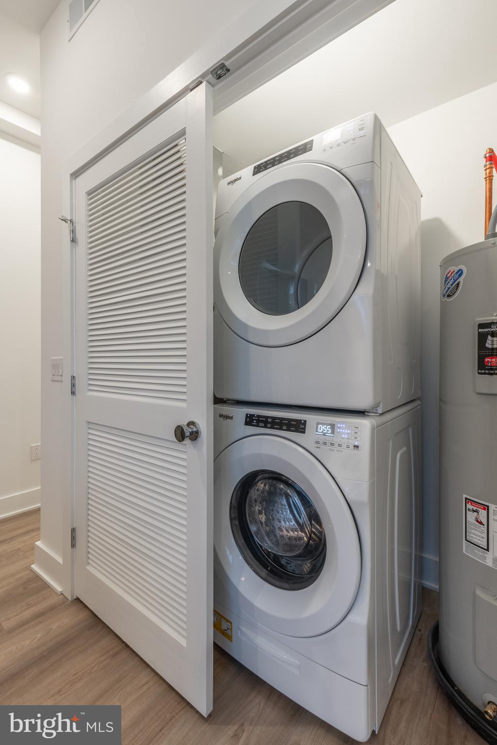5545 Pulaski Avenue, Unit 401 Philadelphia, PA 19144 - Photo 11 of 16 a utility room with dryer and washer