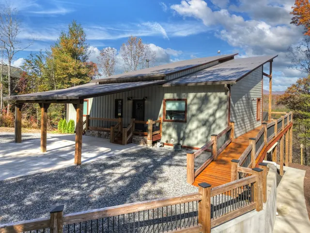 a view of a patio with a table and chairs