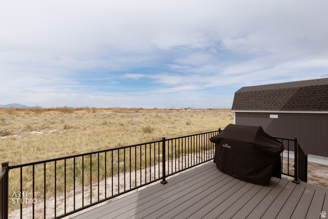 540 Lefty Lane Tooele, UT 84074 - Photo 28 of 48 Wooden deck featuring area for grilling and a view of countryside