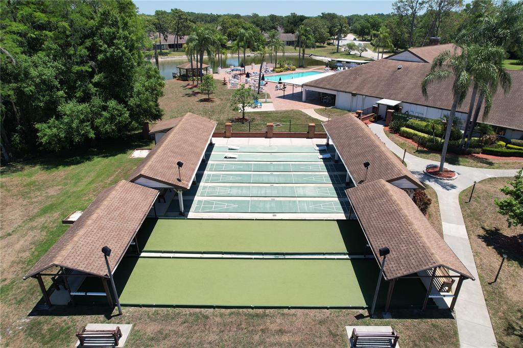 9319 Trowbridge Court New Port Richey, FL 34655 - Photo 76 of 78 an aerial view of a tennis ground and a city view