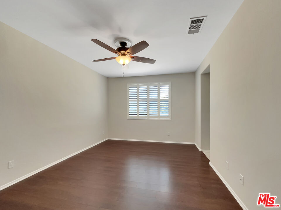 24025 Via Sereno Valencia, CA 91354 - Photo 21 of 27 wooden floor in an empty room with a window