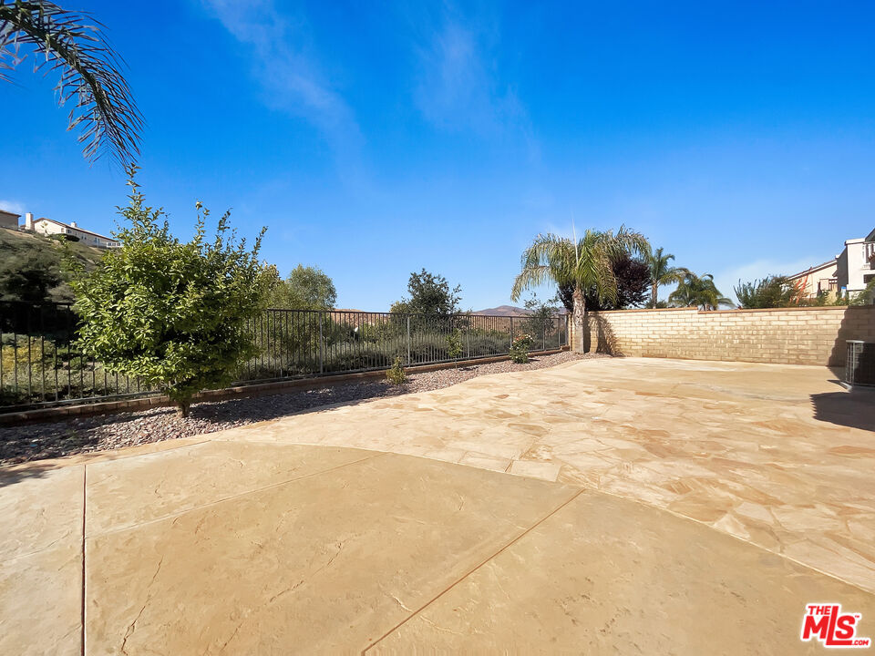 24025 Via Sereno Valencia, CA 91354 - Photo 25 of 27 a view of backyard of a house
