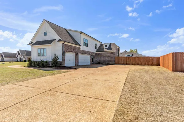 a front view of house with yard