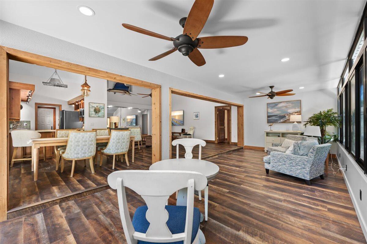 109 Seashore Drive Jupiter, FL 33477 - Photo 13 of 46 Sun Room view to Dining/Living/Kitchen