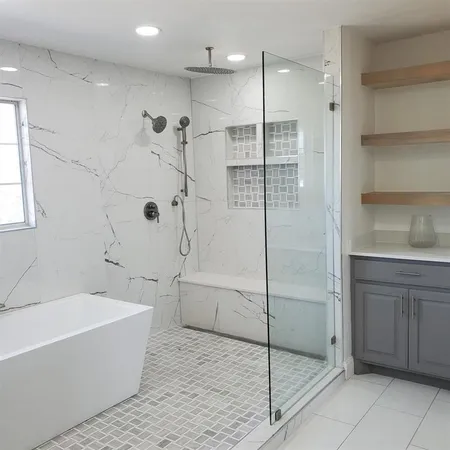a bathroom with a bathtub and a shower